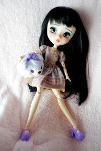 Poison Girl's Dolls Mayu on fluffy blanket.